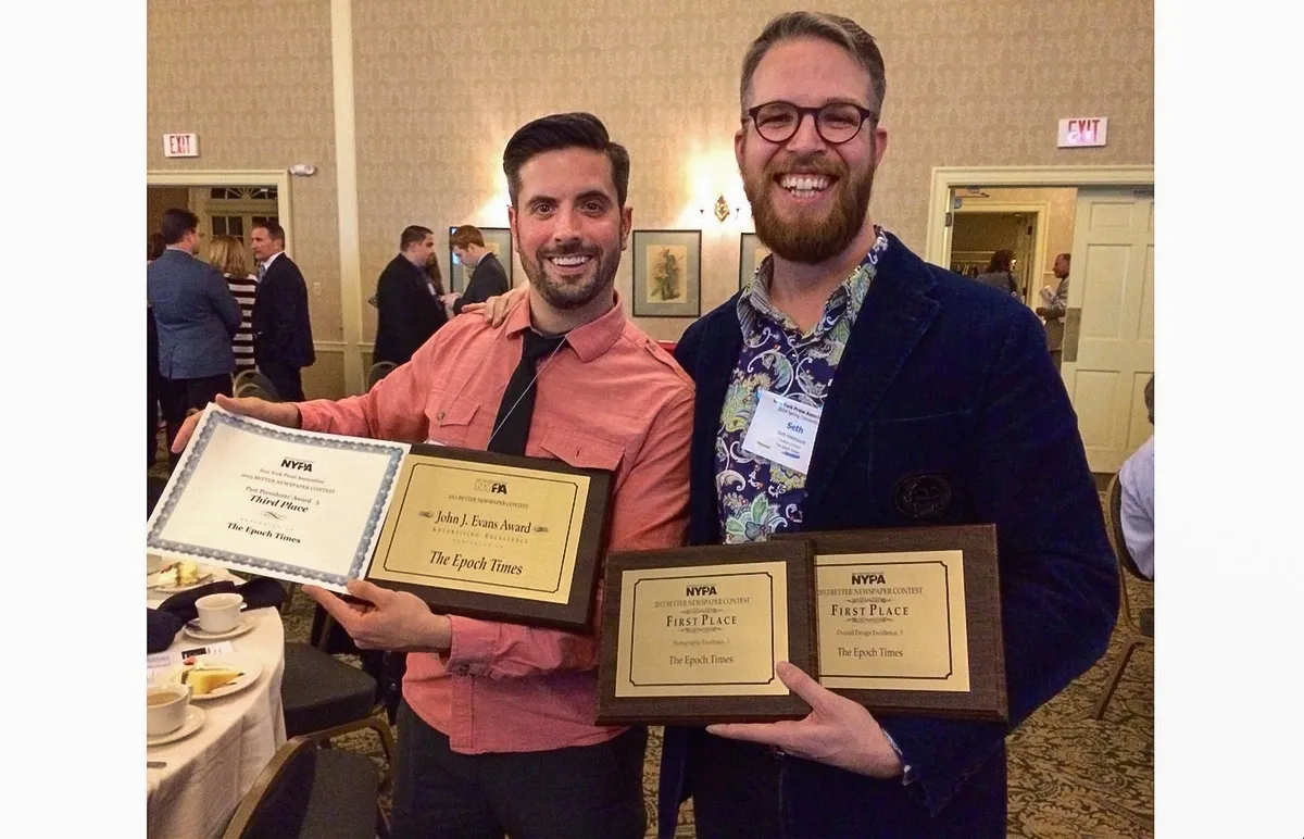 Epoch Times Creative Director Seth Holehouse and Associate Creative Director Robert Counts hold awards