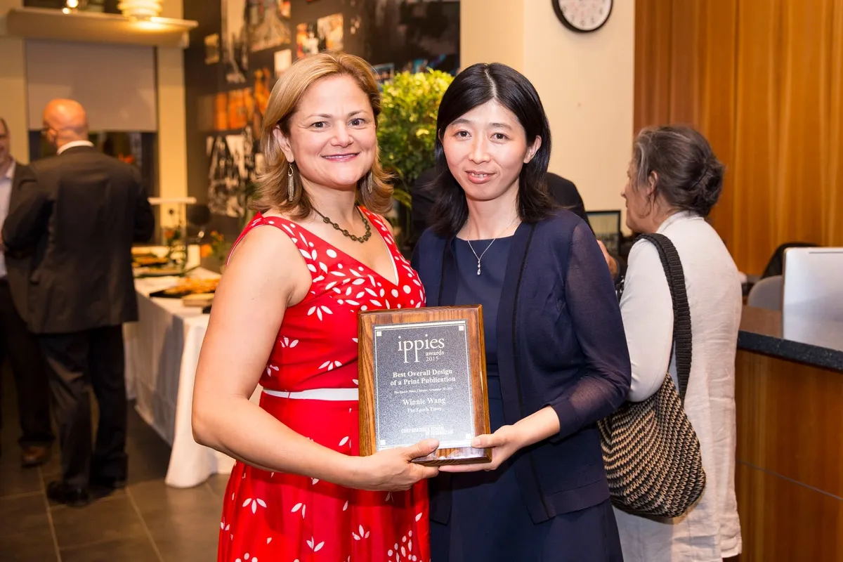 Melissa Mark-Viverito, Speaker of the New York City Council, congratulates Winnie Wang on the award